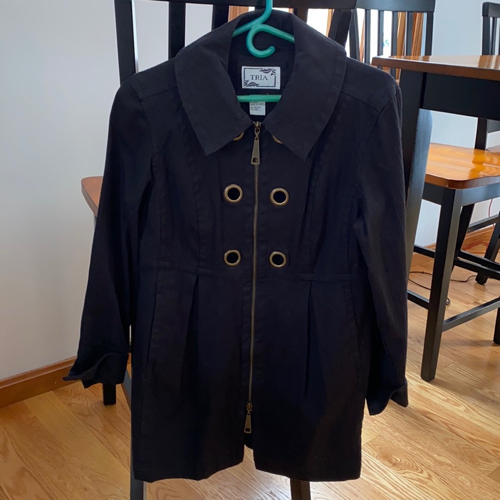 TRIA zip-up coat. Falls below hips.